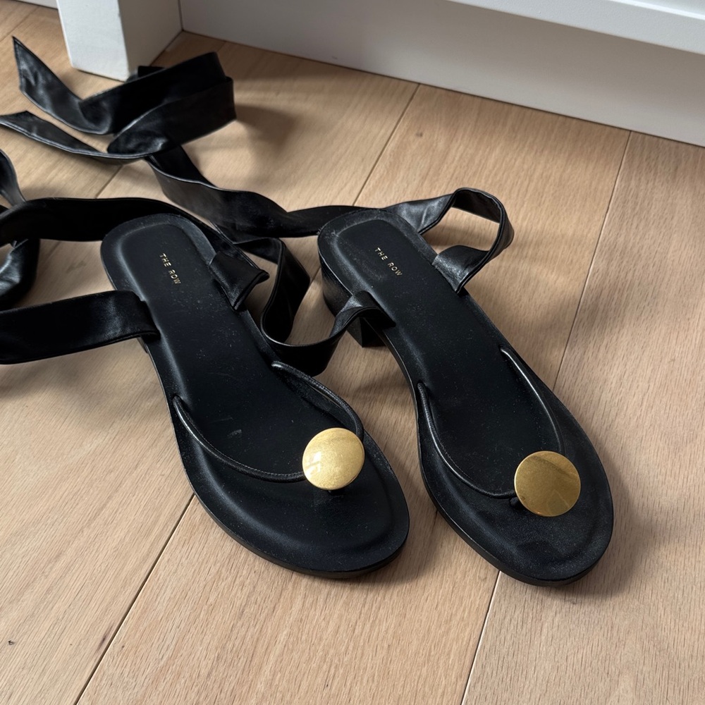 The Row Black Sandals with Gold Accent